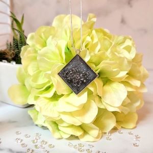 Resin filled Grey necklace on a silver plated chain